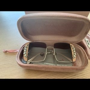 Miu Miu Womens sunglasses
